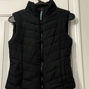 Black puffer vest.